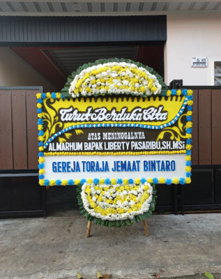 Papan Bunga Duka di Anawai